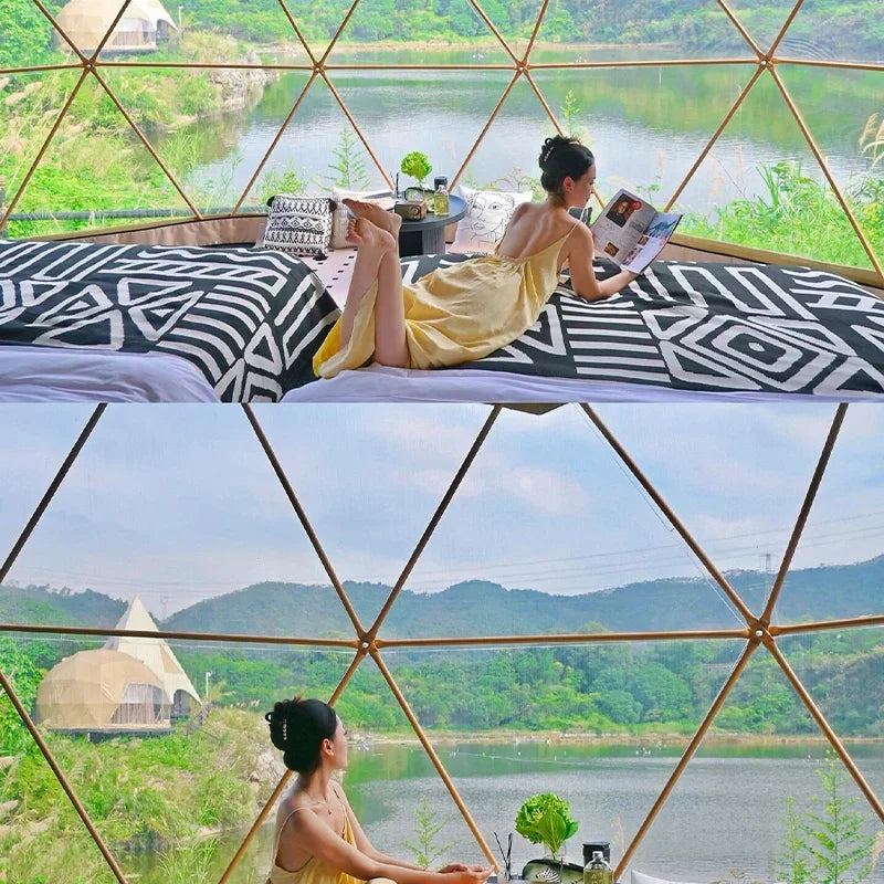 A luxury dome tent with a private bathroom and kitchenette, ideal for a hotel-style outdoor stay
