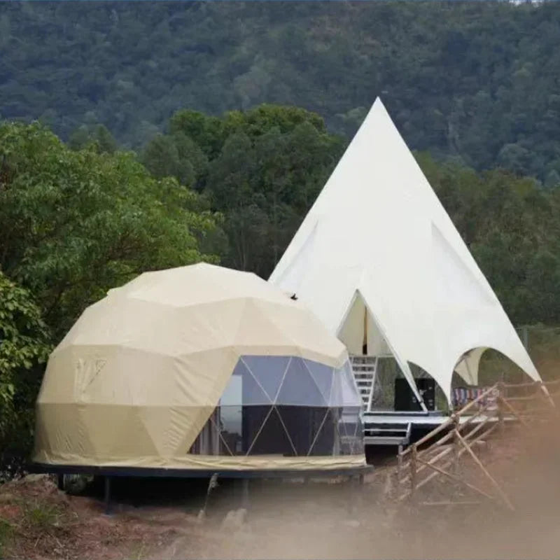 A luxury dome tent with a private bathroom and kitchenette, ideal for a hotel-style outdoor stay
